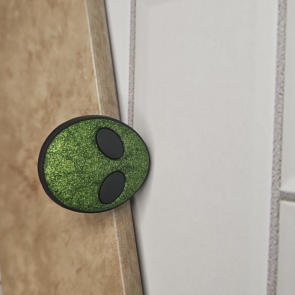 Glittery Green Alien Face Rubber Pin